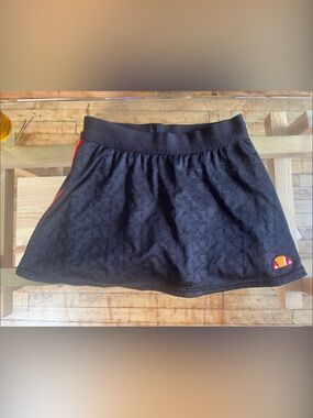 Ellesse Black Skater Skirt with Orange Logo Accent
